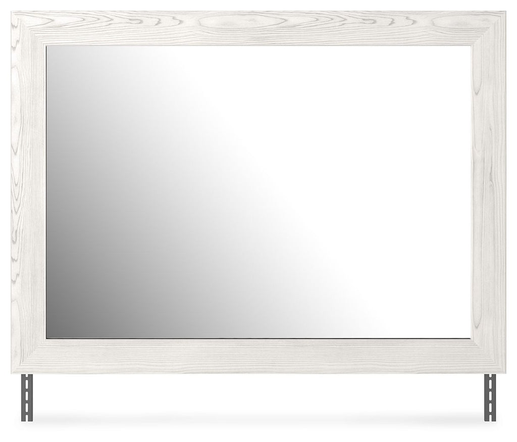 Rectangular bedroom mirror with white woodgrain frame and gray reflective glass