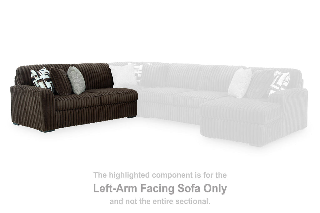 Left-arm facing sofa section in dark chocolate brown corded fabric, with light cushion.