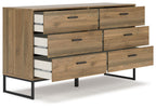 Light brown dresser with multiple drawers and black legs
