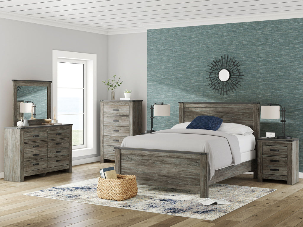 Gray panel bedroom set with bed, nightstands, dresser, and mirror.