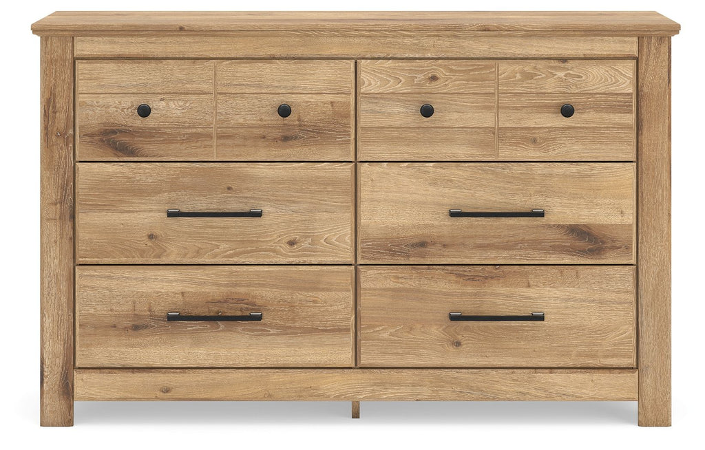 Light brown six-drawer dresser with black knobs and bar pulls, front view
