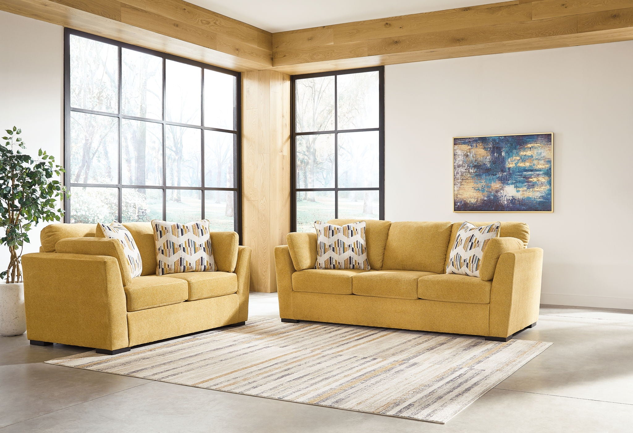Yellow living room set with sofas and accent chair