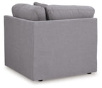 Gray fabric wedge sectional armchair, side view with boxy seat and rolled arm