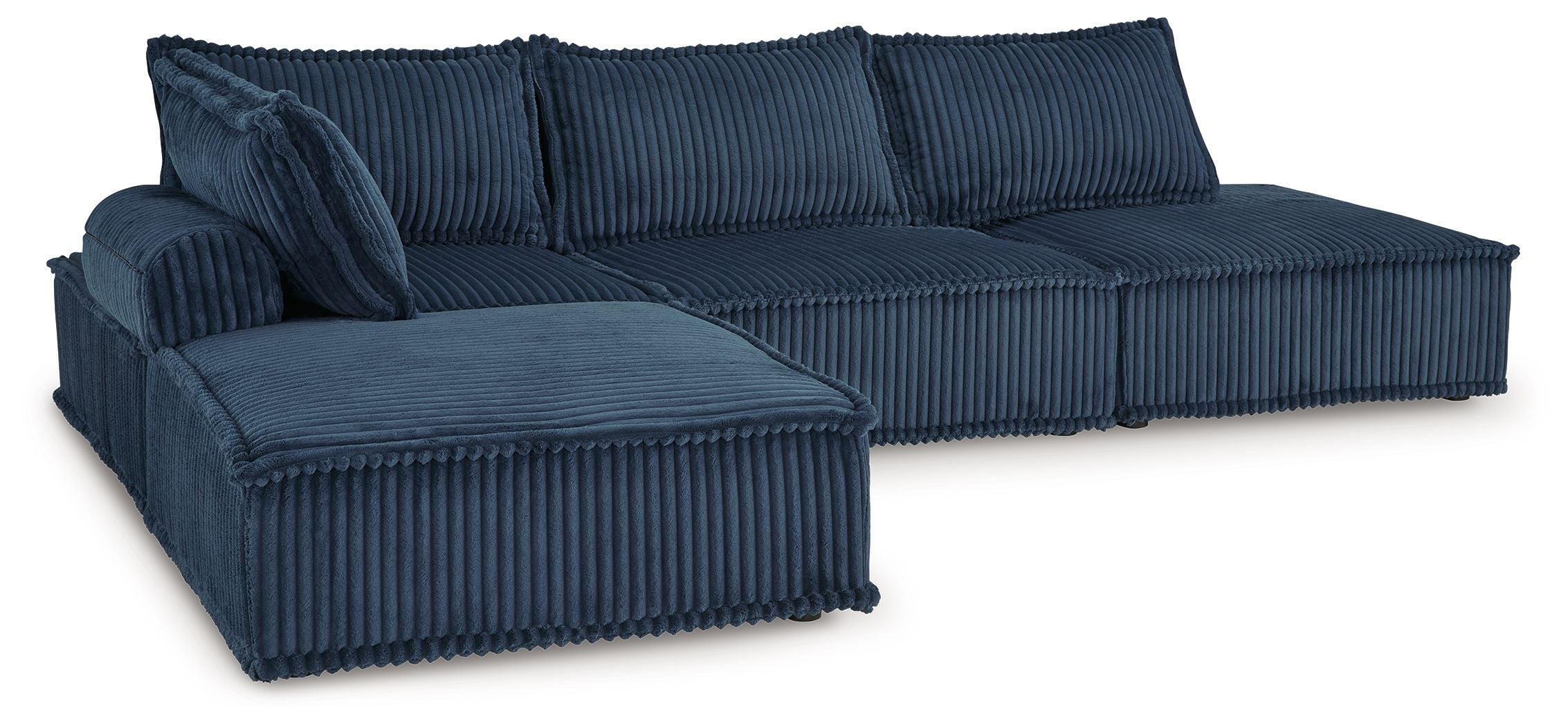 Navy modular sectional sofa with ribbed upholstery, chaise and two throw pillows