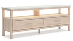 Light wood TV stand with two drawers and two open compartments under the top