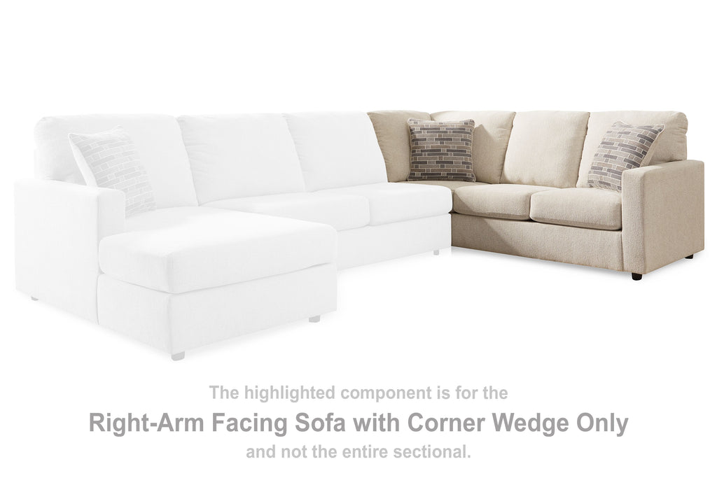 Light gray sectional sofa with corner wedge, right-arm facing, with fabric throw pillows