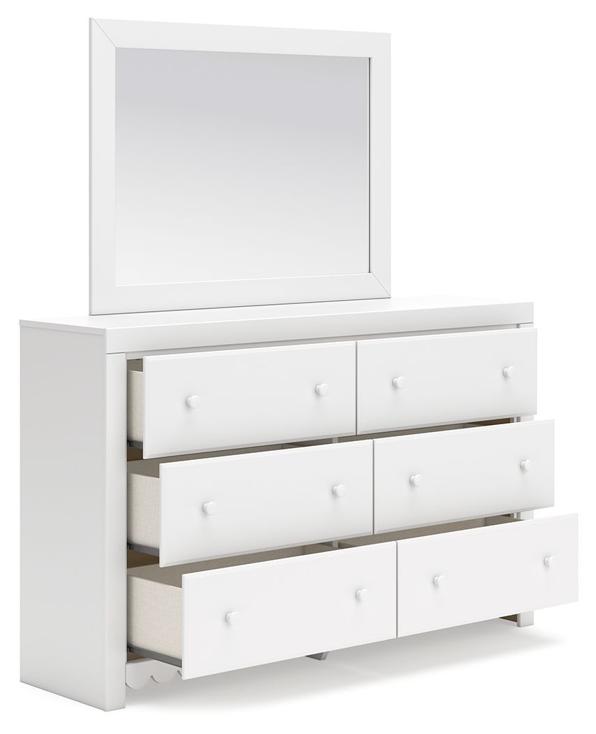 White dresser with mirror, open drawers showing storage, round knobs, scalloped apron