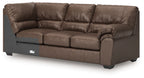 Umber brown corner wedge sofa with rounded arm and deep tufted back cushions