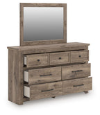 Light brown dresser with mirror and open drawer space