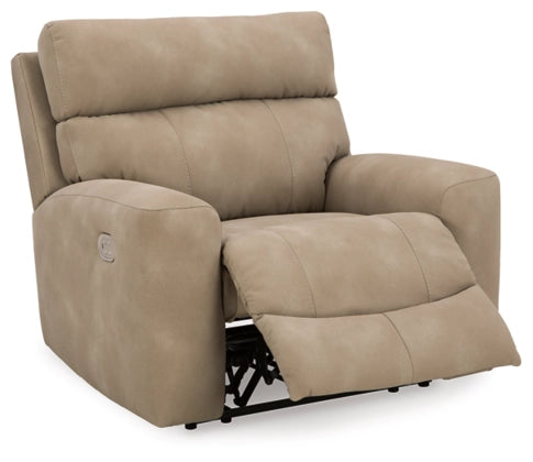 Sand beige recliner with adjustable headrest and wide padded arms