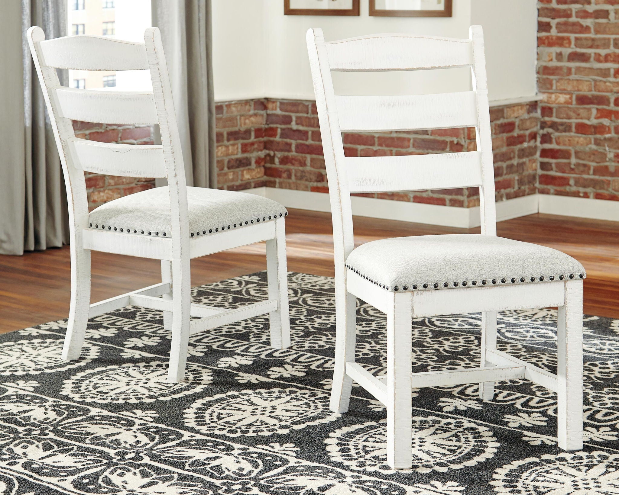 Set of 2 dining side chairs with white frames, beige upholstered seat and nailhead trim