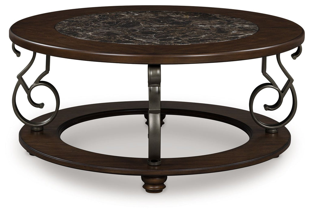 Dark brown round cocktail table, marble inset top, wrought-iron base with scroll accents