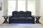 Dark gray reclining living room set loveseat with tufted back and blue-lit base