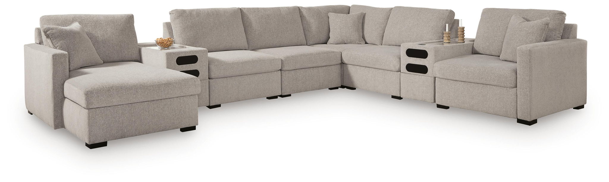 Gray sectional sofa with chaise ottomans, storage cubes, and matching arm pillows