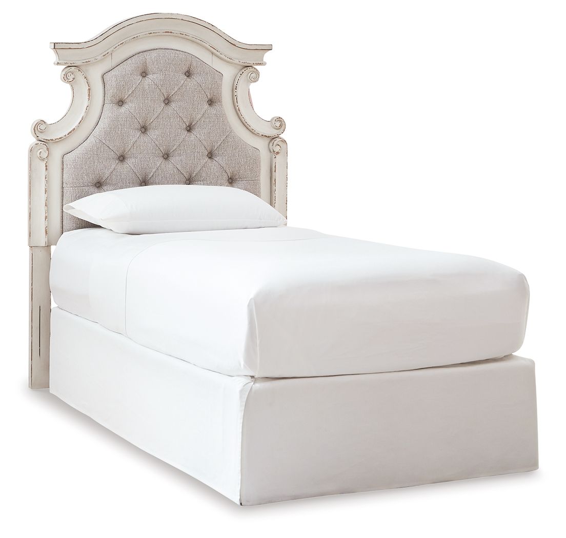 Twin bed frame with beige button-tufted headboard and chipped white wood frame