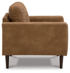 Caramel-brown upholstered accent chair angled view with rounded back and arms