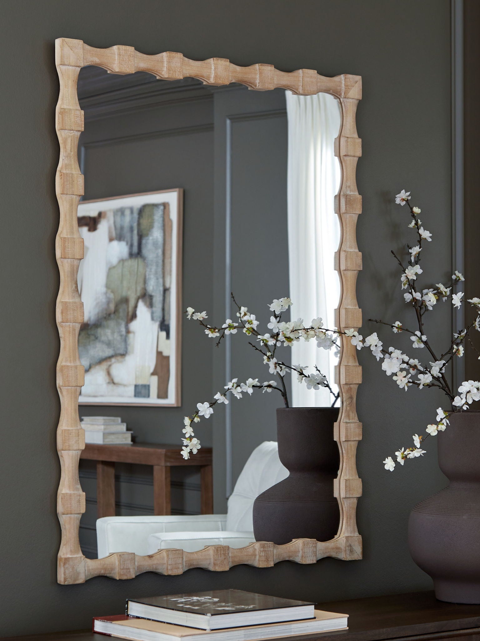 Accent mirror with light brown bamboo-style frame, rectangular shape
