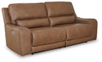 Light brown power reclining sofa with adjustable headrests and padded armrests