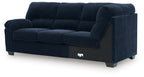 Navy corner wedge sofa with deep seat cushions and square track arms