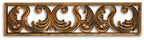 Carved wood wall decor band with ornate scroll accents on dark natural frame.