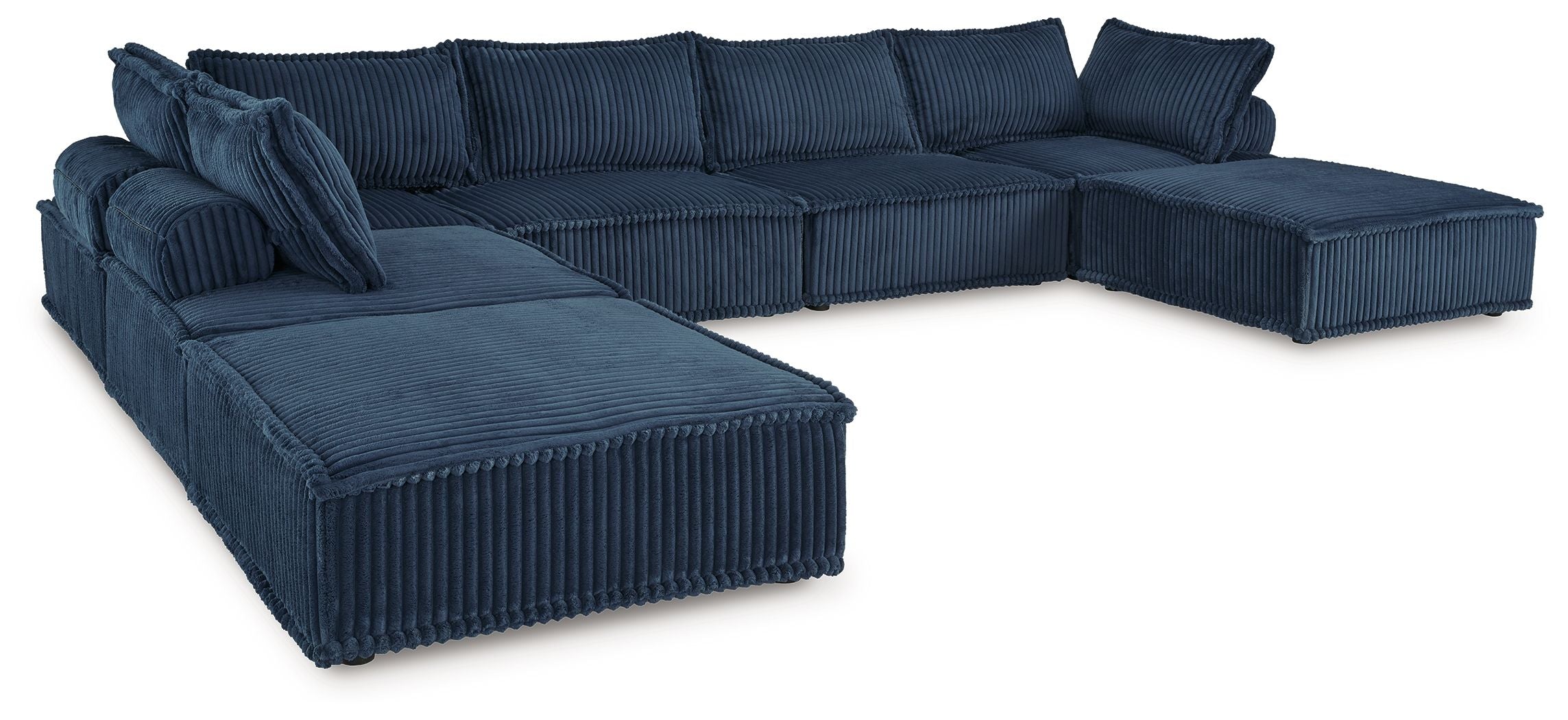 Navy modular sectional sofa with chaise lounge and multiple back cushions
