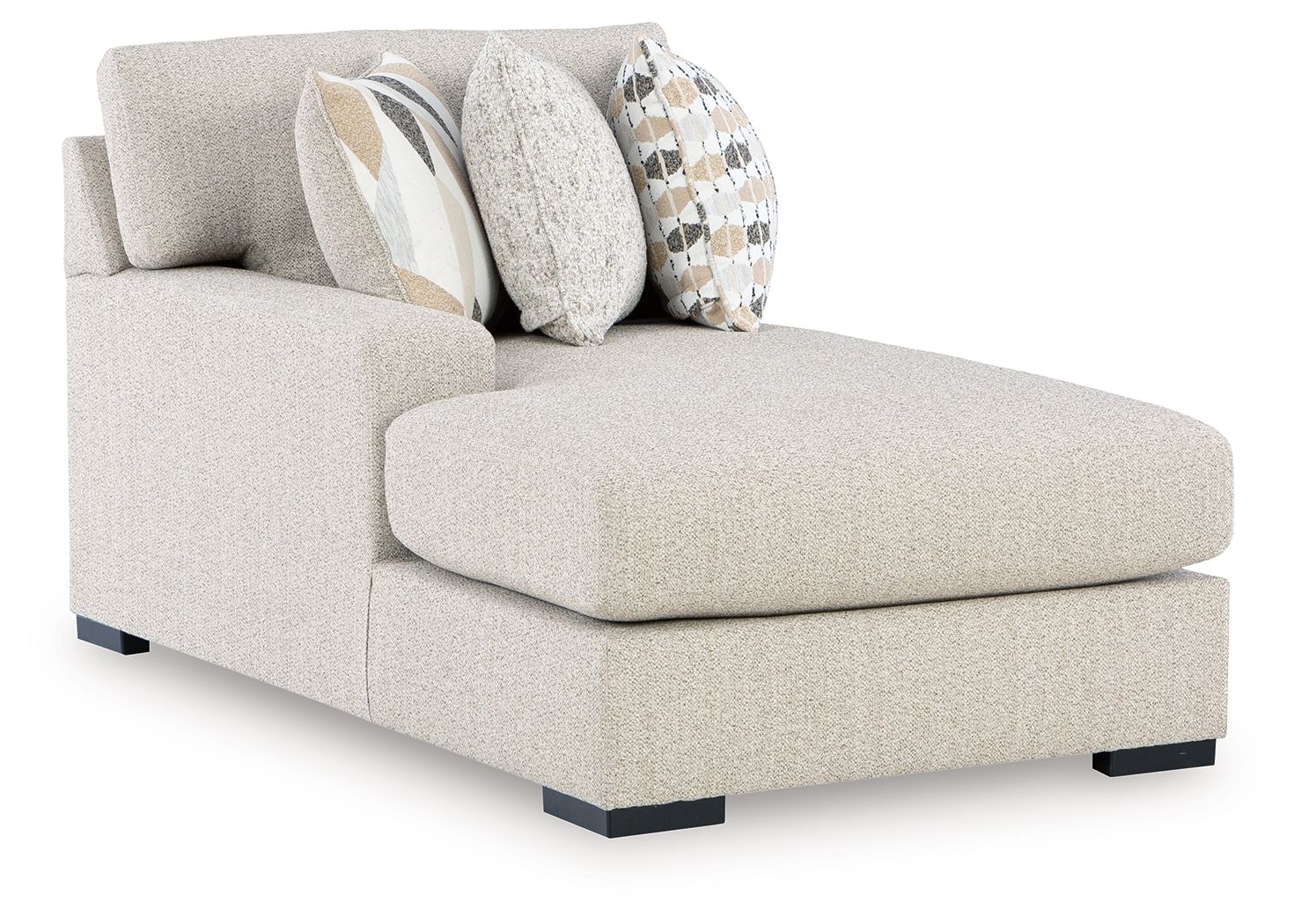 Light pebble fabric corner chaise with squared arms, black legs, and patterned throw pillows