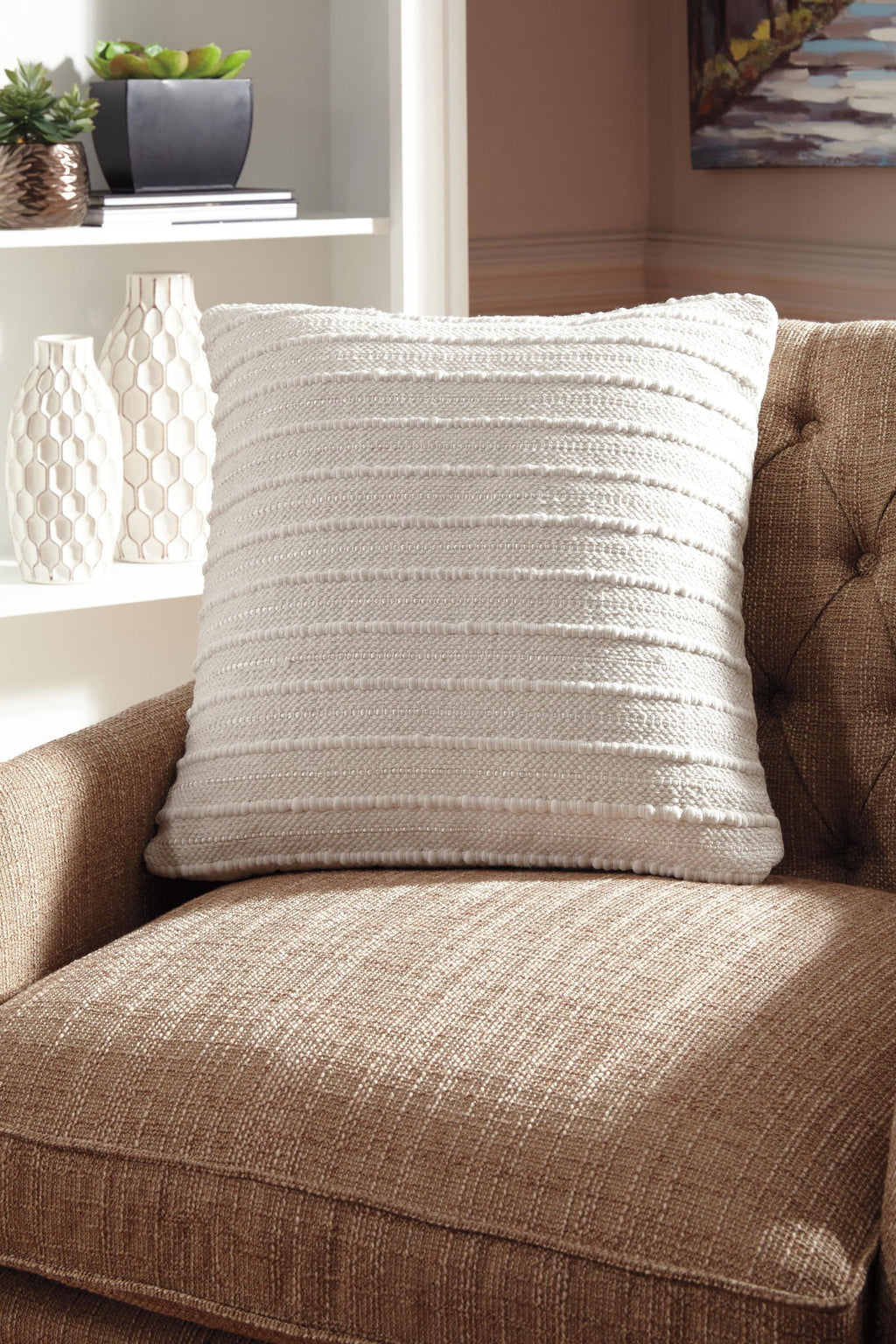 Theban beige decorative pillow with textured weave and stacked horizontal stripe pattern