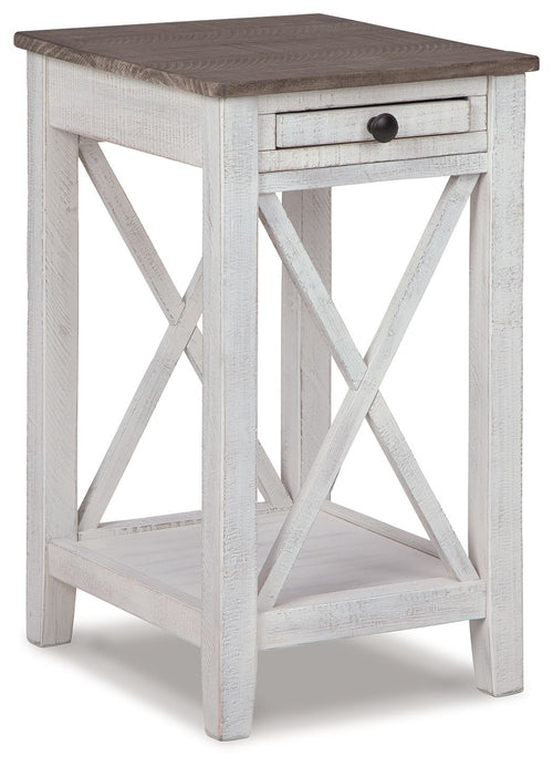 Accent table with open shelf, drawer, weathered white finish and dark gray top.
