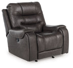 Smoke rocker recliner chair in dark gray faux leather with padded arms and headrest