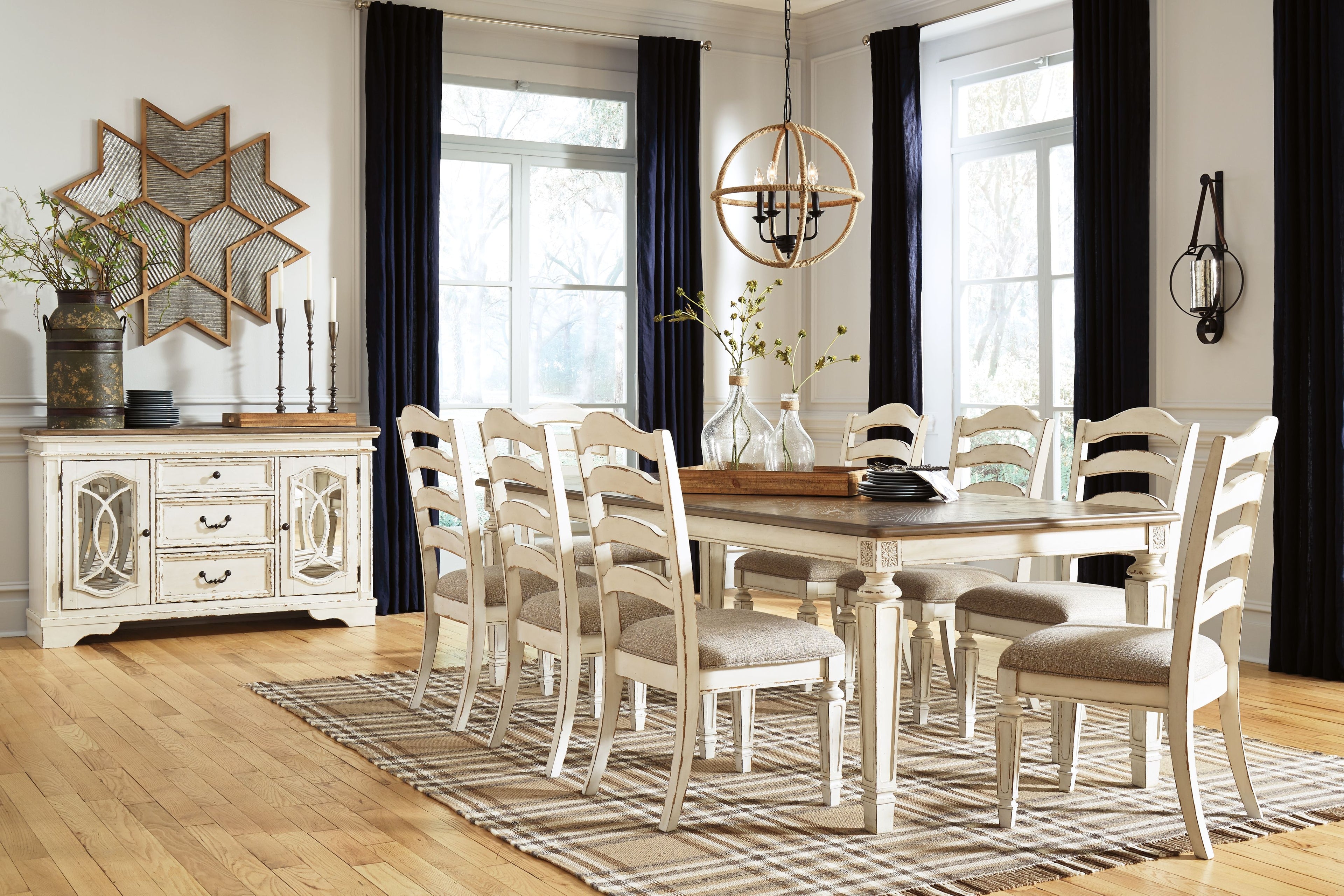 White dining table set with spindle-back chairs and rectangular table for dining