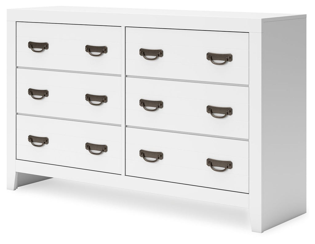 White side view dresser with drawers and dark metal pull handles