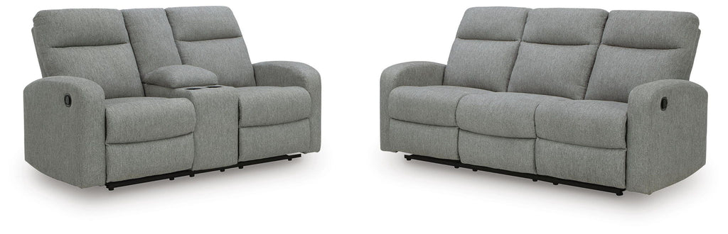 Light gray reclining loveseat with padded arms, tufted seat and black base