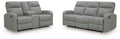 Light gray reclining loveseat with padded arms, tufted seat and black base