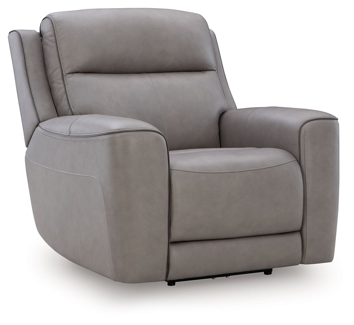 Power recliner chair with adjustable headrest, gray fabric upholstery.