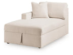 Corner chaise with storage in light oyster fabric, two back pillows, left-facing arm