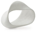 White abstract sculpture with a circular cutout, smooth stone-like finish.