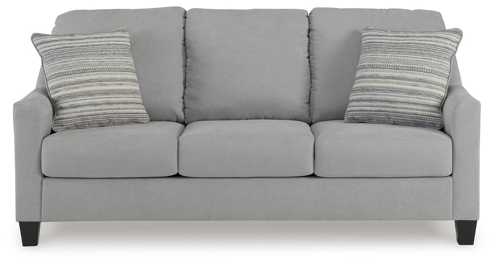 Light gray queen sofa sleeper with three seat cushions and two striped throw pillows