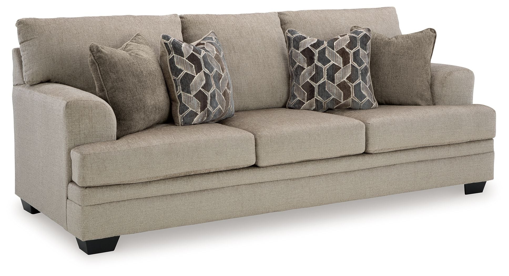 Stonemeade sofa, light taupe fabric, with two geometric throw pillows
