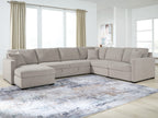 Gray sectional sofa with chaise corner and ottoman-style end seats
