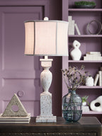 White drum-shade lamp with distressed speckled base and brown finish flecks