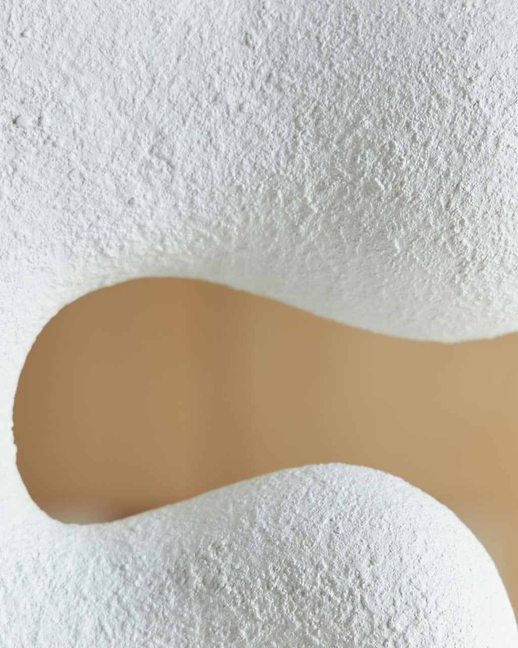 Lavarsen white textured sculpture detail with rounded indentation