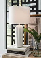 Ceramic table lamp with white ribbed base and large square fabric shade