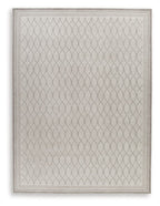 Gray rug with geometric trellis pattern and framed border