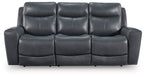 Dark gray power reclining sofa with three seats and padded headrests