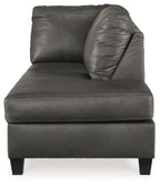 Fog gray leather corner chaise with padded backrest, rounded arm, and square feet.
