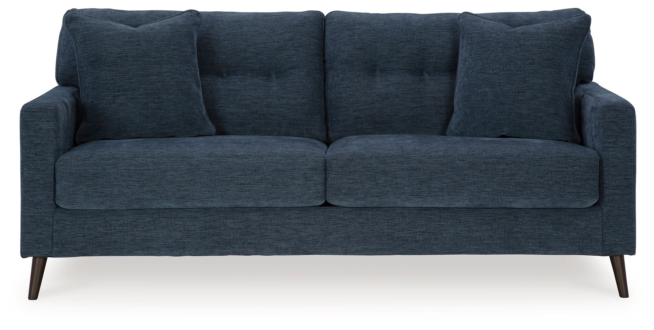 Navy blue fabric sofa with split seat cushions and four back pillows