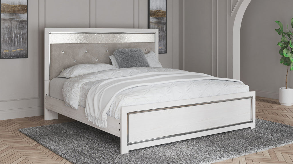 King bed with white frame and beige upholstered headboard, diamond-tufted