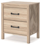 Two-drawer nightstand with herringbone side panels and black bar pulls