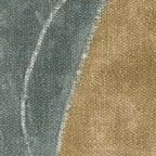 Upholstery fabric swatch in blue-green and tan woven texture