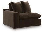 Fabric corner sofa chair with wide arms and back cushions, dark brown upholstery